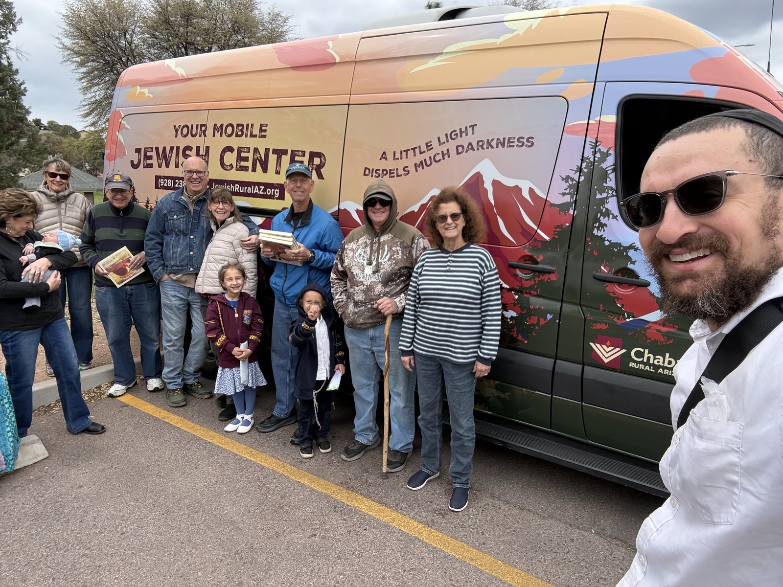 Community members gather at the Mobile Jewish Center in the high country